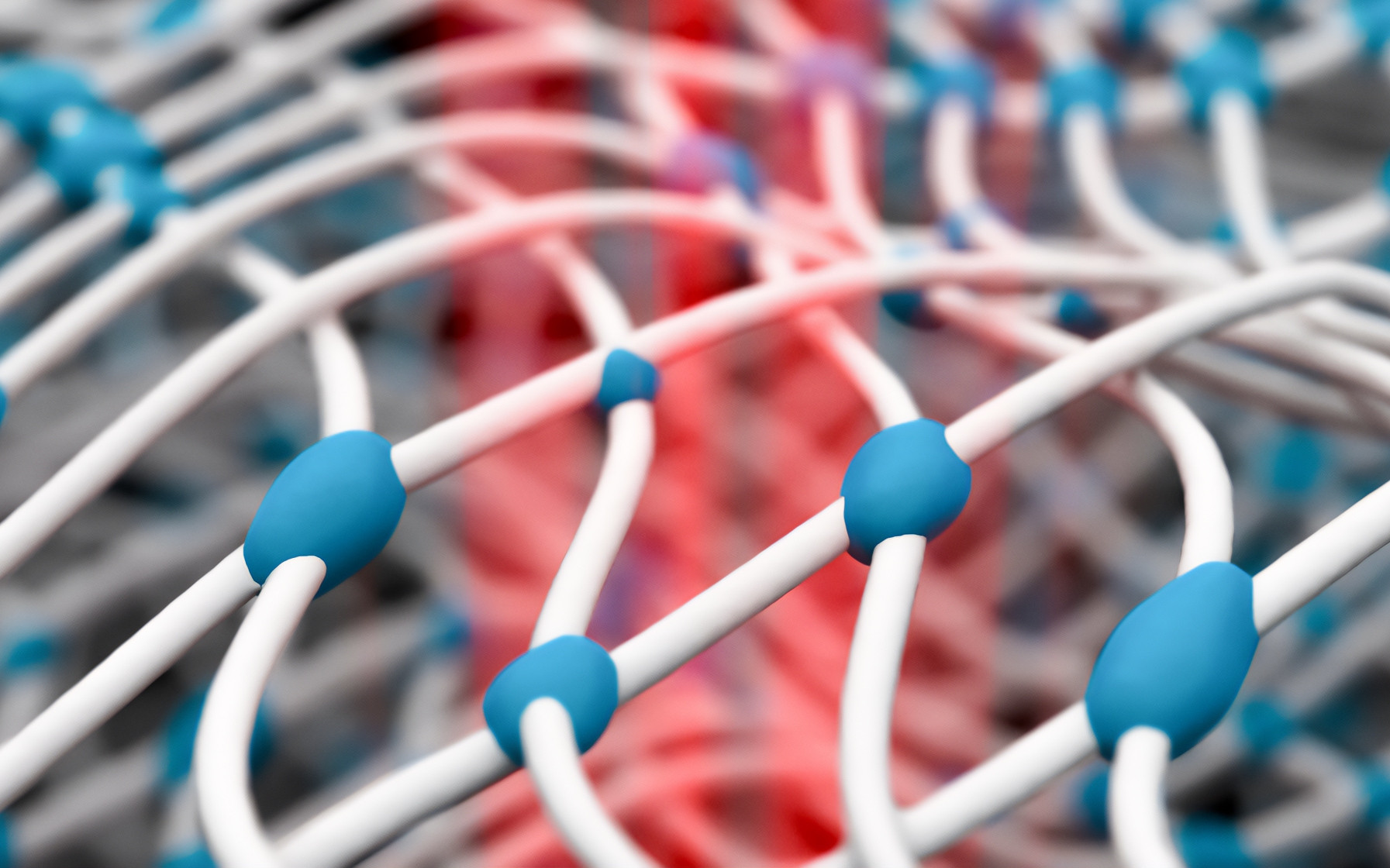 Schematische Darstellung eines belichteten Polymernetzerwerks: Der Vernetzungs- und Aushärtegraden von Kunststoffen lässt sich dank des neuen optischen Messverfahrens produktionsnah bestimmen.